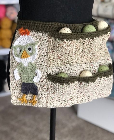 A Fresh Take On The Handmade Egg Apron … Form & Function Meet Up On The Crochet Hook! | KnitHacker Crochet Egg Apron, Apron Crochet, Crochet Apron, Egg Apron, Egg Collecting Apron, Auction Gift Basket Ideas, Crochet Egg, Egg Aprons, Chicken Aprons