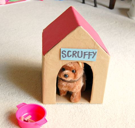 Little homemade toy doghouse with stuffed toy dog Cardboard Dog, Diy Cardboard Toys, Cardboard Diy, Ikat Bag, Valentine Diy, Cardboard Box Crafts, Cardboard Toys, Dog House Diy, Cardboard Playhouse