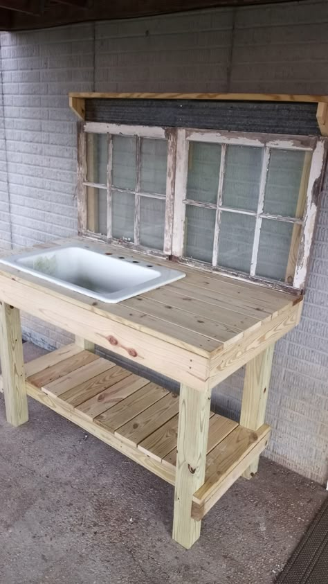 Potting table with old farmhouse sink! Potting Bench With Farmhouse Sink, Porch Sink Ideas, Outdoor Potting Bench With Sink, Back Porch Sink Ideas, Rustic Outdoor Sink, Vintage Sink Planter, Potting Bench With Sink Diy, Backyard Sink Ideas, Garden Sinks Outdoor Diy