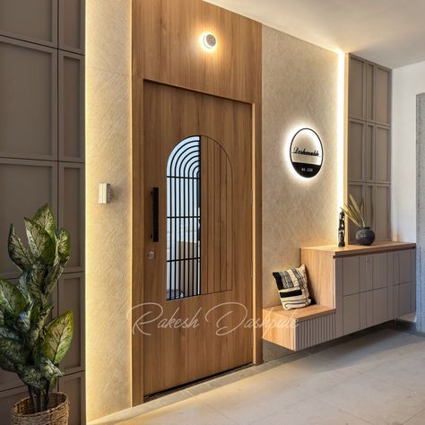 Walk through the welcoming entrance into a stylish lobby with modern interior design, where comfort and elegance make you feel right at home from the moment you arrive. 🛋️✨
.
.
@aligninteriorsbyrakesh @rdashpute
.
.
#interiordesigner #interiordesigning #stylishinterior #puneinteriors #homedecor #lobbydesign #enterancedecor #enterancedoor Modern Entrance Lobby Design Residential, Safety Door Design Entrance Modern, Entrance Lobby Design Residential, Flat Entrance Lobby Design, Lobby Design Residential, Enterance Decor, Entrance Lobby Design, House Main Door, House Main Door Design