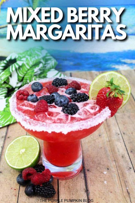 Bring summer sipping to your next gathering with these Mixed Berry Margaritas. Refreshing, fruity, and a little bit sweet, this cocktail is sure to be a hit with your friends. Made with tequila, Grand Marnier, sweet and sour mix, and a medley of raspberries, blackberries, blueberries, and strawberries, these margaritas are a burst of sweet, tart, and boozy! Berry Margarita, Blueberry Margarita, Cocktail Party Appetizers, Blueberries And Strawberries, Blackberry Margarita, Strawberry Cocktails, Orange Syrup, Sour Mix, Smoothie Makers