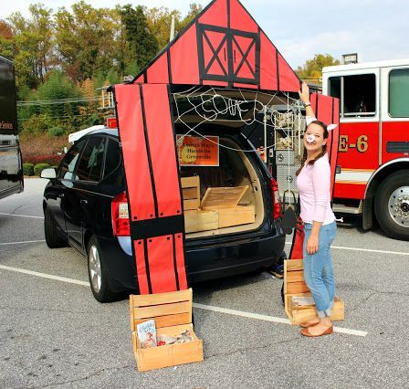 You could make this with PVC pipe, cardboard, colored paper, hot glue, baskets from goodwill, cobwebs from the Dollar Tree, one descent sized spider, fake green plastic grass or burlap or just scattered hay, and a hay barrel. Of course a pig nose ties it all together :) Barn Trunk Or Treat Theme, Butterfly Trunk Or Treat, Dollar Tree Trunk Or Treat Ideas, Trunk Or Treat Decorating Ideas, Church Trunk, Trunker Treat Ideas, Church Halloween, Trunk Ideas, Fall Festival Games