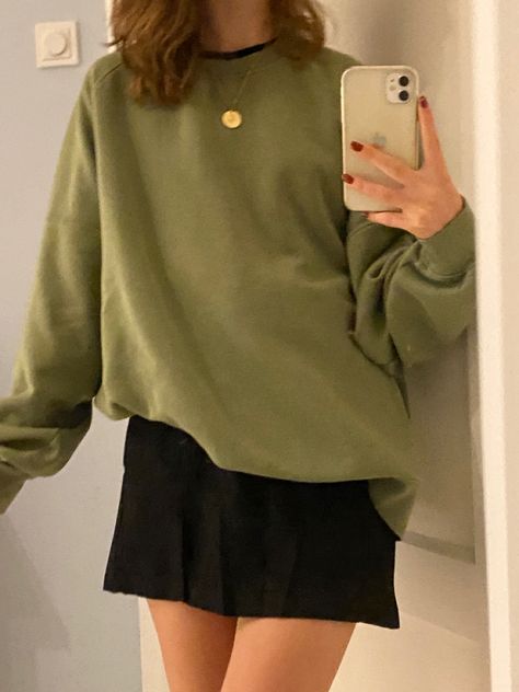 Green Crew Neck Sweatshirt Outfit, Green Sweater Black Skirt, Green Sweatshirt Aesthetic, Sweatshirts And Skirts Outfit, Skirts And Sweatshirts Outfit, Crewneck Sweatshirt Outfit Winter, Dark Green Sweatshirt Outfit, Black And Green Outfit Aesthetic, Forest Green Outfit Aesthetic