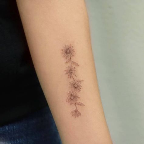 Forearm tattoo black and grey fine line delicate daisy chain Flower Chain Tattoo, Small Hand Tattoos For Women, White Daisy Tattoo, Daisy Tattoo Ideas, Chain Drawing, Daisy Chain Tattoo, Daisy Tattoos, Black And White Tattoos, Lily Flower Tattoos