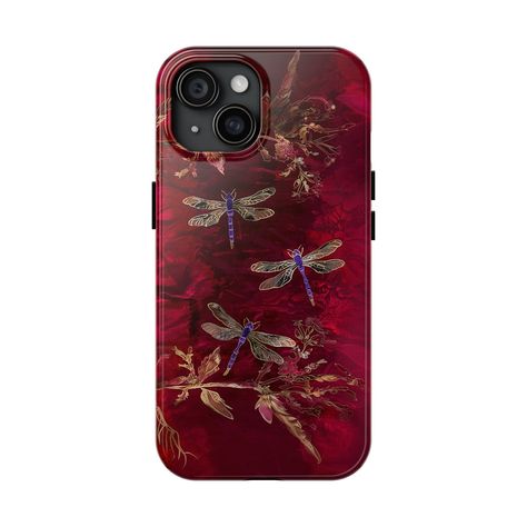 Soar into a world of elegance with the Crimson Flight iPhone Case, featuring a delicate array of dragonflies on a sumptuous red velvet background. This case is a boho-inspired dream for your iPhone 15 Pro Max, offering a tranquil escape with its exquisite, embroidered appearance. For the iPhone 12 Mini, it's a trendy case that doesn't just captivate with its aesthetics but also offers the steadfast protection of a tough iPhone case. Let your phone embody the grace of these ethereal creatures, and the luxurious feel of embossed textures, with a case designed to inspire awe and provide unmatched durability. 📱Tailored to fit Apple iPhone models only (simply choose your model from the drop down menu above). For Samsung, and Google models, visit our store. Product Features: -Constructed with d I Phone 12 Mini Case, Iphone 15 Cases Aesthetic, Painted Phone Cases Diy, Iphone 12 Pro Phone Case, Whimsigoth Phone Case, Casely Phone Case, Dark Red Phone Case, Iphone 15 Pro Max Phone Case, Iphone 16 Plus Case