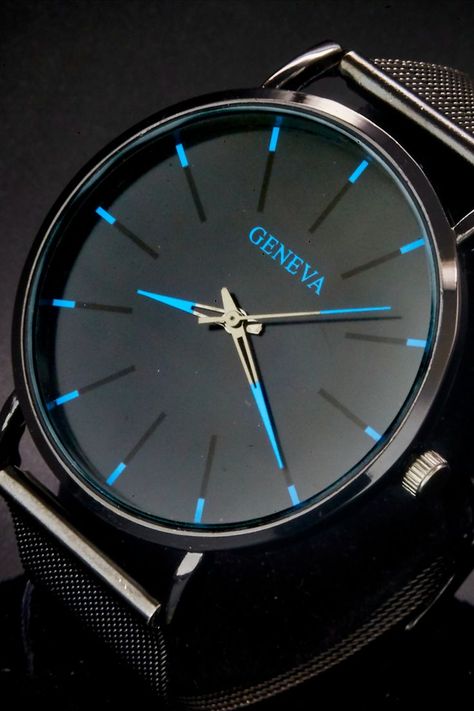 • 2000's Geneva Mens watch • Slim black Stainless Steel case • Black round dial • Blue/black stick hour markers, blue tipped slotted dauphine hands, blue tipped stick second hand • 40mm X 48mm (1.6" X 1.9") • 20mm black metal mesh two piece strap. Fits wrists up to 20.8cm/8.2" • Quartz (battery) GL68 movement—new 377 battery, runs great • Six month warranty for the FULLY RESTORED mechanical workings • Gift wrapping + Express shipping available at checkout Man Gifts, Geneva Watch, Vintage Timepiece, Blue Tips, Mesh Bracelet, Unisex Watches, Metal Mesh, Black Stainless Steel, Blue Bracelet