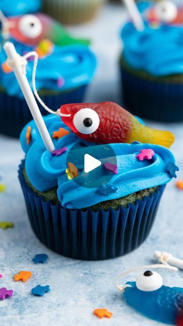 Funfetti on Instagram: "It’s oh-fish-ial! Dad wants fishing pole cupcakes for Father’s Day!🎣⁠ ⁠ Save the easy recipe below for later⬇️⁠ ⁠ You’ll need...⁠ 1 box Funfetti Premium Cake Mix⁠ Additional ingredients to prepare cake mix per package instructions⁠ 1 tub Funfetti Aqua Blue Vanilla Flavored Frosting⁠ 1 (1 lb.) bag soft and chewy fish-shaped candy⁠ Candy Eyes⁠ Small Cake Pop Sticks⁠ White String⁠ Blue Gel Dye⁠ ⁠ Directions:⁠ 1. Heat oven to 350°F. Line 24 muffin cups with paper baking cups.⁠ ⁠ 2. Prepare cake mix according to package directions and add blue gel to dye batter blue. Divide batter evenly into prepared muffin cups. Bake 19 to 23 minutes or until toothpick inserted in center comes out clean. Cool 5 minutes. Remove to wire rack to cool completely.⁠ ⁠ 3. Thread kitchen twin Fish Shaped Cake, Fish Cupcakes, Flavored Frosting, Fish Cake Birthday, Premium Cake, Fishing Cupcakes, Candy Eyes, Retirement Cake, Fish Cakes