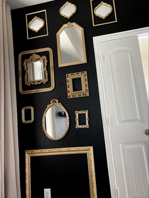 Mirror Wall | Frame Wall | Moody Bedroom | Accent Wall | Black Walls | Gold Frames | Antique Mirrors | Antique Frames | Ecclectic Decor | Moody Decor |
Behr Paint | Behr Black Paint | Interior Design | Master Bedroom Decor | Antiques Gold Wall In Bedroom, Black Wall With Gold Mirror, Black Wall Gold Mirror, Gold Frames On Black Wall, Black Wall With Gold Frames, Black With Gold Mirror, Black And Gold Photo Wall, Black And Gold Gothic Decor, Moody Wall Collage