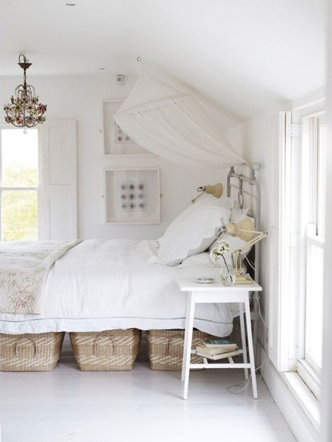 Baskets under the bed are a great place to stash extra stuff — and unlike the traditional under bed boxes, they're nice enough to look at all the time. Under Bed Basket, Foster House, White Bed, Dreamy Bedrooms, Tiny Bedroom, Under Bed, Under Bed Storage, White Bedroom, Beautiful Bedrooms