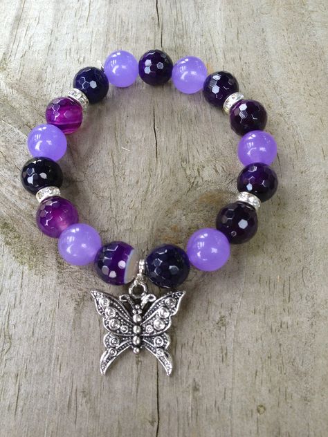 Custom design by MKB Wrist Candy Etc.! A light purple and agate dark purple beaded bracelet with a butterfly charm. Dark Purple Bracelet, Purple Beaded Bracelets, Buy Gold Jewelry, Purple Beaded, Wrist Candy, Purple Bracelet, Beads Bracelet Design, Bracelet Design, Butterfly Charm