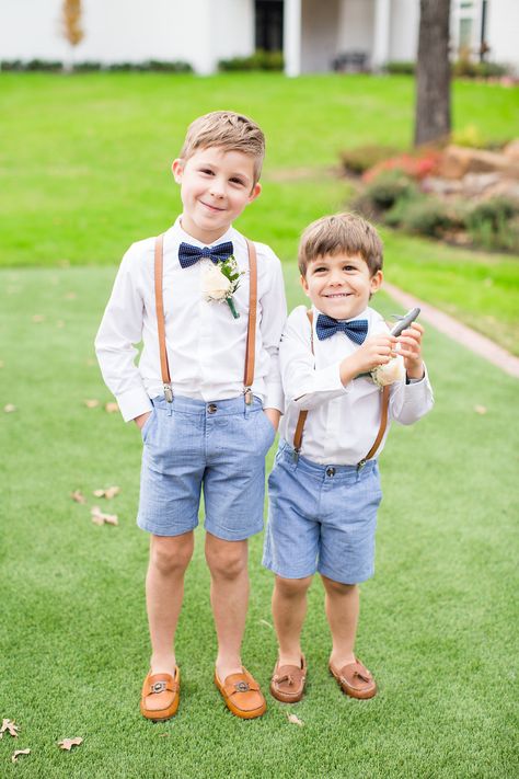 | "frat boy" ring bearers | ring bearers in shorts, suspenders, and navy blue bow ties | cutest ring bearers | chic wedding style | spring wedding style | dfw wedding photographer | wedding inspiration | peach + navy blue wedding ideas | photo taken at THE SPRINGS Event Venue. follow this pin to our website for more information, or to book your free tour! SPRINGS location:  Rockwall Manor in Rockwall, TX photographer:  Allison Maxwell Photography #ringbearer #springwedding #weddingideas #wedding Ring Bearer Outfit Shorts, Wedding Ideas Blue, Boy Ring, Navy Blue Bow Tie, Kids Wedding Outfits, Chic Wedding Style, Ring Bearer Boy, Wedding Outfit For Boys, Ring Bearer Flower Girl