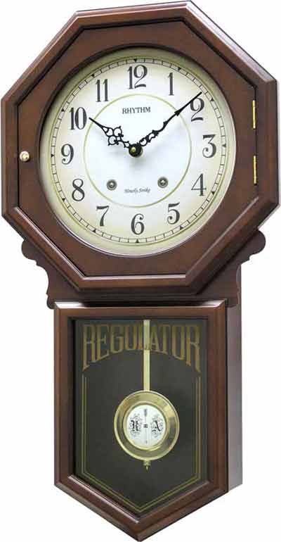 <p> The Colonial Clock by Rhythm is a traditional regulator wall clock crafted in a beautiful walnut finish. This model is equipped with a no winding needed 2 note Antique Clocks Vintage, Chiming Wall Clocks, Wall Clock Craft, Clock Work, Antique Wall Clocks, Model Tips, Grandfather Clocks, Wood Carving Furniture, Artificial Plants Decor