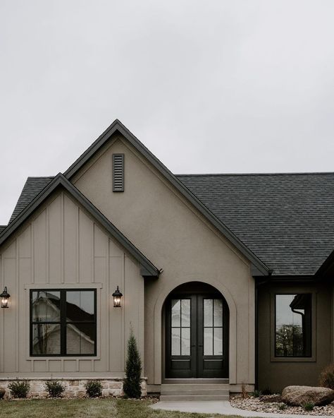 We are dead over this exterior🤤 It turned out even more beautiful than we imagined! • • • • 📸@brookepavel #exterior #exteriordesign… | Instagram Tan House Exterior With Wood Accents, Two Toned Brick House Exterior, Light Grey Painted Brick House Exterior, All Siding House Exterior, Parade Of Homes Exterior, Brown Outdoor Paint Exterior Houses, Colors To Paint Brick Exterior, Black Exterior House With Brick, Siding Colors With Black Windows