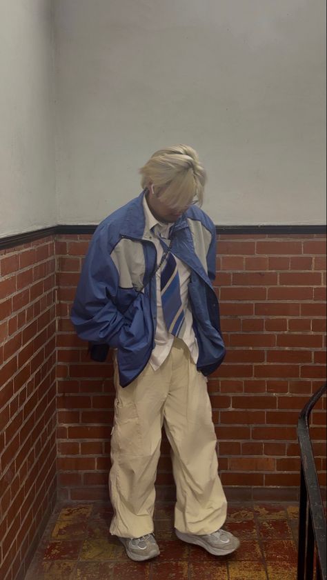 retro vintage blue jacket vintage silk striped blue tie jaded london ecru parachute pants fila trifecta pants Blue Windbreaker Outfit Men, Grey Sneaker Outfits, Parachute Jacket Outfit, Blue Tie Outfit, Grey Parachute Pants Outfit Men, How To Style Windbreaker, White Windbreaker Outfit Men, Blue Pants Outfit Aesthetic, Windbreaker Outfit Aesthetic