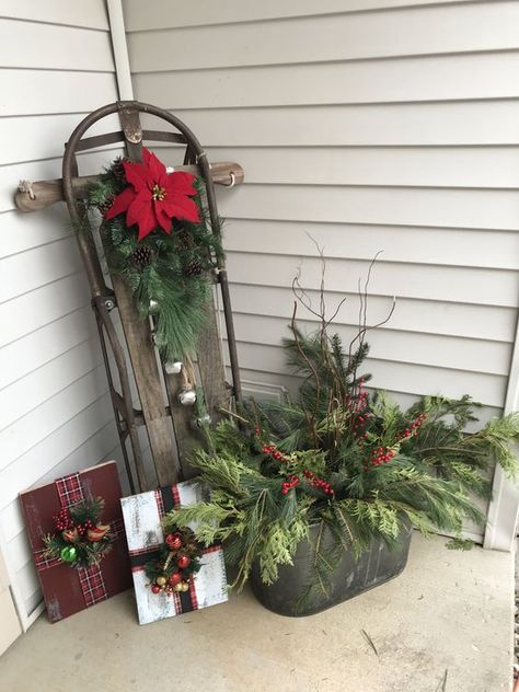 27 Stunning Christmas Porch Decor Ideas Old Sled Christmas Decor, Christmas Sled Decoration Front Porches, Sled Decorating Ideas Diy, Sled Christmas Decor, Christmas Sleighs, Nativity Tree, Christmas Sled Decoration, Christmas Crate, Country Deco