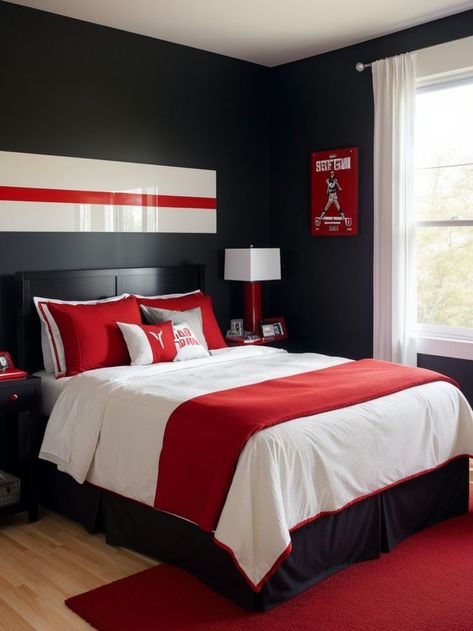 Create a bold boys bedroom with an eye-catching red accent wall. Pair it with a sleek black bed frame and incorporate sports-themed decor for a dynamic and energetic vibe. Black And Red Boys Bedroom, Ninja Bedroom, Black And White Boys Room, Guy Bedroom, Red Boys Bedroom, Red Accent Wall, Red Bedroom Decor, Blue Gray Bedroom, Gaming Bedroom