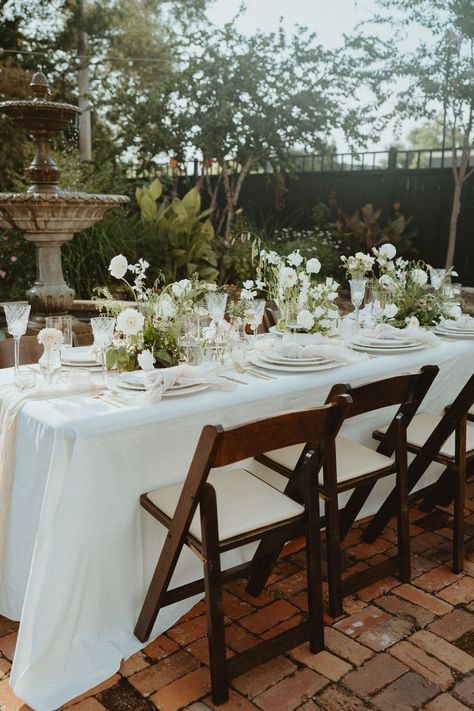 Summer garden wedding styling inspiration green & white flowers & foliage by Ruzin Cunningham Photos | Atlanta & Destination Wedding Photographer | garden themed wedding, summer garden wedding, wedding reception table, Italian china, white wedding flowers, white wedding table decor, estate garden wedding table inspiration White And Greenery Table Setting, Simple Garden Wedding Table Decor, Minimalist Garden Wedding Reception, White Garden Party Wedding, White Garden Party Decoration, Greenhouse Wedding Table Decor, Harvest Tables Wedding, Green And White Spring Wedding, Garden Elegant Wedding