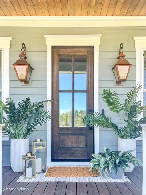 Coastal Cottage Porch, Coastal Farmhouse Backyard, Cream House Porch Color, Gray House Porch Decor, Coastal Planters Front Porches, Coastal Inspired Home Exterior, Coastal Front Entry, Coastal Farmhouse Outdoor Decor, Front Door Coastal Home