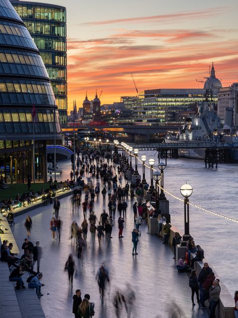 https://flic.kr/p/29bHfGL | Walking on the Thames Path at London City Hall | London, England, UK - September 27, 2018: Pedestrians and tourists walk along the River Thames Path beside City Hall and HMS Belfast at sunset. City Hall London, Hms Belfast, London Walking Tours, Thames Path, River Thames, England Uk, London City, Belfast, City Hall