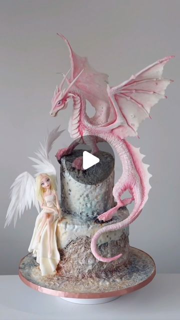 Dionis Iarovoi on Instagram: "Guardians of the sky! People always ask me, what do you like to sculpt the most? Dragons, angels, whatever has wings. One day of work and everything is ready! #cakeschool #cakeart #cakedesign #dragons #angels #loveart #fondant #modelling #sugarart #madewithlove #mystyle #cake #cakedesign #cakedecorating" Fondant Dragon, Fondant Modelling, Fondant People, Dragon Cakes, Fondant Figures Tutorial, Sky People, Dragon Cake, Sculpting Tutorials, First Day Of Work