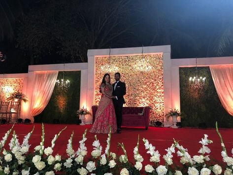 Photo By MoonGate - Venues Open Stage Decorations Wedding, Indian Wedding Reception Backdrop, June Decorations, Shaadi Decoration, Muhurtham Decor, Stage Decorations Wedding, Stage Decoration Photos, Wedding Backdrop Lights, Reception Theme