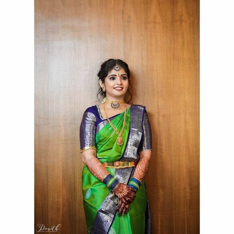 Green  #kanchipuram  #silk #saree in navy blue silver zari  border from  manufacturer at kanjivaram silks.  🛒 Click the link to see prices  designs :  https://kanjivaramsilks.com/kanchipuram-silk-sarees/  we make wedding sarees in your design and colour.  📱 WhatsApp: 9677063537  Fabric: Pure kanchipuram silk  Zari :  1 gram gold zari   Shop address: Kanchipuram silk sarees store, 251/9 Gandhi road, next to petrol bunk, Kanchipuram 631501.  #kanchipuramsarees   #kanchipuramsilksarees #silksare Green Blue Silk Saree, Green And Blue Saree, Green Kanchipuram Silk Saree, Navy Blue Saree, South Indian Bride Saree, Bride Saree, Blue Blouse Designs, Blue Silk Saree, Bride Hairstyle