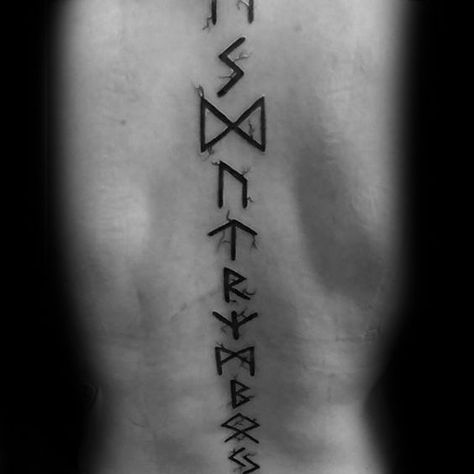 Center Of Back Rune Spine Tattoos For Guys Viking Rune Spine Tattoo, Runes Back Tattoo, Manacled Tattoo, Dramione Tattoo, Rune Tattoos, Hieroglyphics Tattoo, Runes Tattoo, Viking Rune Tattoo, Viking Tattoo Symbol