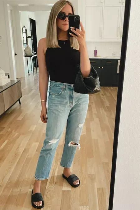 Black High Neck Tank Top Outfit, Jeans And Black Tank Top Outfit, Black Tank And Jeans Outfit, Spring Black High Neck Tank Top, Black Cropped Tank Top For Everyday, Chic Black Cropped Tank Top, High Neck Tank Top Outfit, Chic Slightly Cropped Tank Top, Black Top Outfit Casual