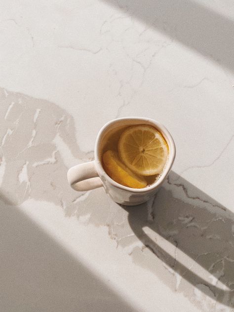 Lemon water, morning routine, yellow aesthetic, morning light, white kitchen aesthetic, white aesthetic, white marble Morning Rituals Aesthetic, Morning Mindfulness Aesthetic, Simplify Aesthetic, Morning Ritual Aesthetic, Hormones Aesthetic, Morning Meditation Aesthetic, Wellness Aesthetic Photography, Morning Light Aesthetic, Morning Tea Aesthetic