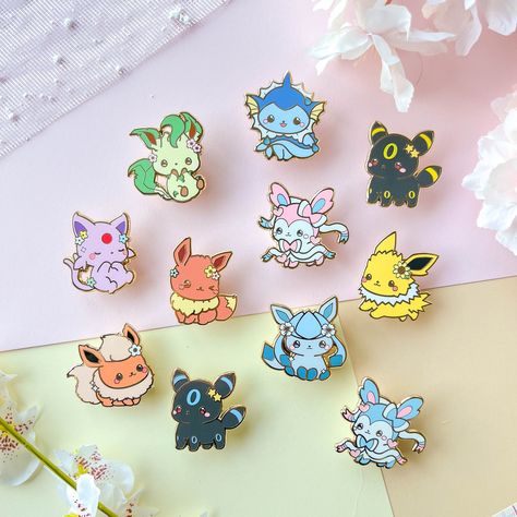 ♥ Range between 39-41mm  ♥ Set of 9 pins  ♥ Hard Enamel Pin  ♥ Gold Plating ♥ Rubber Clutch ♥ Backing Card ♥ Engraved backstamp  ♥ Colours may vary between your monitor's colours and physical product.  Since enamel pins are handmade, even standard grade pins may have minor imperfections - please read our grading guide for more information. Pokemon Enamel Pin, Cute Enamel Pins, Pokemon Accessories, Pokemon Pins, Cute Pokemon Pictures, Pokemon Coloring Pages, Pokemon Coloring, Cute Stationary, Cute Doodles Drawings