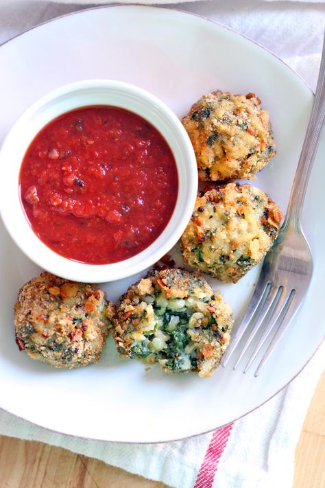 These Oven-Baked Spinach and Barley Arancini are kid friendly, healthy, delicious, and super easy to make! Plus, you can freeze them for later. If you're looking for a healthy alternative to frozen chicken nuggets, this is it! Vegetarian Bowl, Italian Rice Balls, Vegetarian Bowls, Baked Spinach, Italian Rice, Unprocessed Food, Rice Balls, Healthy Delicious, Vegetable Sides