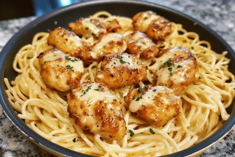 Whip up Garlic Butter Chicken Bites with Creamy Parmesan Pasta in 30 minutes! A savory, family-friendly dish perfect for weeknight dinners. Garlic Butter Chicken Bites With Creamy, Golden Garlic Chicken Bites Over Creamy Parmesan Pasta, Family Friendly Dinner Ideas, Butter And Garlic Pasta, Husband Dinner Ideas, Garlic Butter Chicken Bites With Creamy Parmesan Pasta, Garlic Chicken Parmesan Pasta, Garlic Butter Chicken Pasta, Creamy Parmesan Pasta