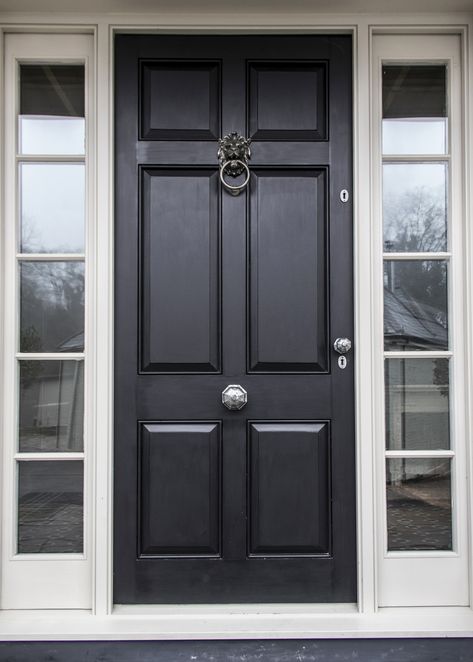 The exterior of your property should benefit from the same care and attention as the interior. Your front door welcomes family and guests and gives you an opportunity to reflect the style and feel within your home.  Our octagonal pewter knobs contrast brilliantly with the dark paint colour of this panelled door and the lion head door knocker in antique pewter finishes this classic look. Front Door With Door Knocker, Front Door With Knocker, Front Door Glass Panel, Dark Front Door, Navy Front Door, Apartment Front Doors, Front Door Black, Victorian Front Door, Apartment Front