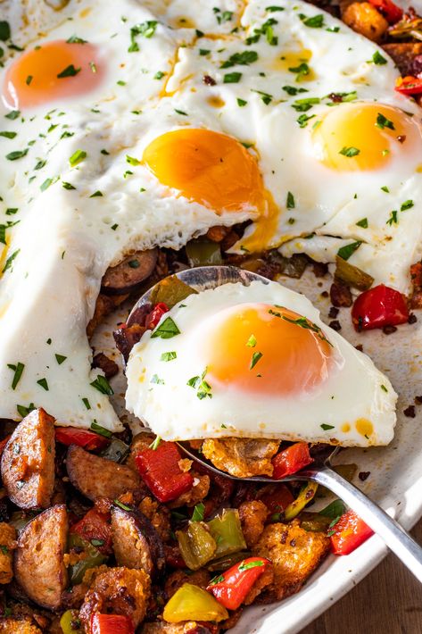 Slightly crunchy, slightly chewy bread, rich pork flavor from chorizo and bacon, and softened peppers with a fried egg on top. Migas Recipe, Chewy Bread, Cookie Toppings, Red Bell Peppers, Leftover Bread, America's Test Kitchen Recipes, Sherry Vinegar, Food Basket, Kitchen Recipe