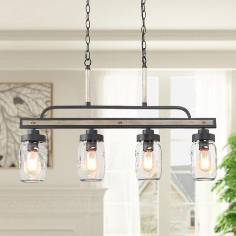 Stash a fabulous expression to any room in your home with the addition of this LNC Araphi 4-Light Black Chandelier. Comes with a durable construction. Wood Chandelier Rustic, Ceiling Interior, Modern Farmhouse Chandelier, Jar Chandelier, Lighting Fixtures Kitchen Island, Mason Jar Chandelier, Modern Farmhouse Lighting, Kitchen Island Chandelier, Kitchen Island Linear Pendant