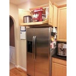 Cupboard Above Fridge, Over Refrigerator Cabinet Ideas, Above The Fridge Ideas, Shelf Above Fridge, Treehouse Homes, Slide Out Shelf, Kitchen Lazy Susan, Downstairs Kitchen, Above Fridge