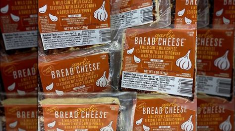 Trader Joe's shoppers are freaking out over its new garlic bread cheese Bread Cheese Trader Joes, Garlic Bread Cheese, Trader Joes Bread, Cheese Powder, Cow Cheese, Bread Cheese, String Cheese, Baked Garlic, Milk And Cheese