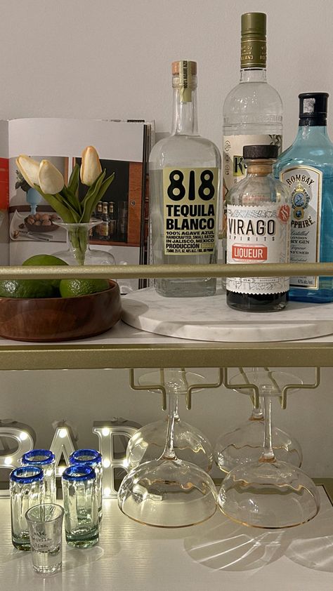 bar cart book gold amazon layout couple glasses liquor liqueur shot glasses bar back lights coffee table books Bar Cart Shot Glasses, Bar Cart Books, Tequila Bar Cart, Bar Cart Glasses, Bar Cart Inspo College, Cute Bar Carts, Shot Glasses Aesthetic, Bar Cart Set Up, Bar Cart Ideas Apartments