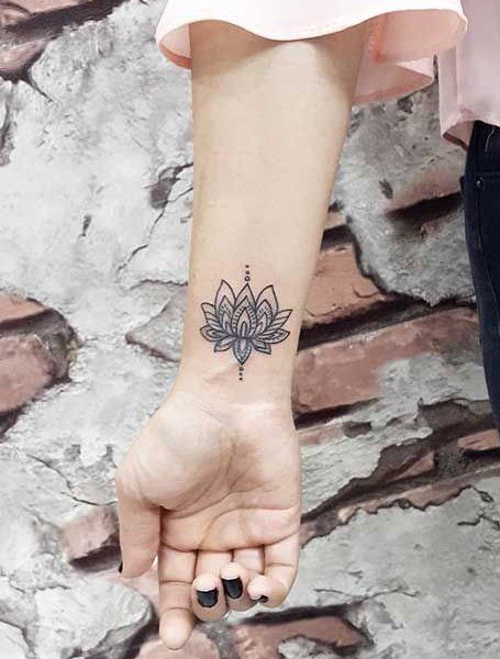 25 Beautiful Lotus Flower Tattoos for Women in 2021 - The Trend Spotter Lotus Flower Tattoo Ideas, Lotus Flower Tattoo Meaning, Small Lotus Flower Tattoo, Flower Tattoo Ideas, Lotus Tattoo Design, Shape Tattoo, Lotus Mandala, Wrist Tattoos For Women, Lotus Tattoo