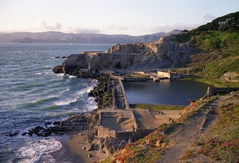 It may be hard to believe from the looks of it today, but at the time of its opening in 1890 the Sutro Baths were the world's largest indoor swimming establishment. Consisting of seven pools, the baths were a popular destination for locals and visitors alike. Sutro Baths San Francisco, Road Trip America, Travel San Francisco, Road Trips With Kids, San Francisco Vacation, Road Trip Stops, California Hiking, Restaurants In San Francisco, San Francisco Photography