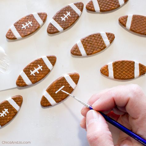 Wooden Biscuit Crafts, Wood Biscuits Crafts, Buffalo Bills Diy, Wood Biscuit Crafts, Football Garland, Making Garland, Chiefs Crafts, Wood Biscuits, Fall Diys