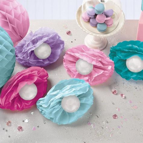 This table decorating kit creates five fluffy centerpieces complete with opalescent pearls. Each pastel piece is a scalloped tissue paper oyster shell that you add a small pearly white balloon to. pbShimmering Mermaids Seashell Pearl Fluffy Table Decorating Kit product details:-b-p ul li10-piece decorating kit-li liIncludes ul li5 fluffy seashells 9.25in wide-li li1 each of 5 colors: bright pink light blue pink teal and purple-li li5 pearl white balloons 5in-li -ul -li liSimple assembly required Mermaid Party Decorations Table, Pink Teal Birthday Party, Mermaid Party Table Decor, Mermaid Table Centerpieces, Mermaid Table Decorations, Pearl Balloons, Halloween Kit, Table Decorating, Mermaid Party Decorations