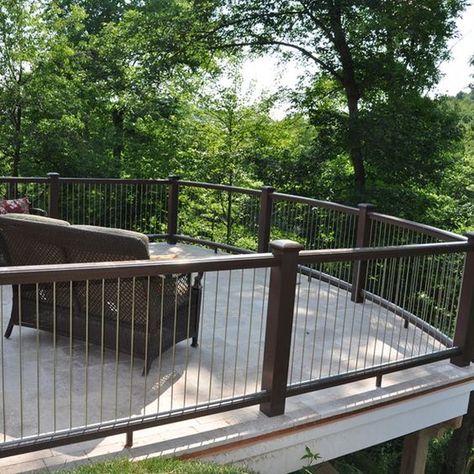 This extended summer weather means extra time out back, enjoying the sights from your patio/deck. Make sure you see it all in its fullest with Invis-A-Rail. Simple to assemble and install, better than regular vertical cable railing in every way.

#InvisARail #compositedecking #designbuild #decks #outdoorliving #decklife #deckbuilder #patiobuilder #patiodeckbuilder #Patiodesign
#verticaldeckrailing #outdoorlivingdesign #diydecks Porch Trex Decking, Vertical Cable Deck Railing Ideas, Deck Railing Vertical, Vertical Railing Deck, Country Deck Railing Ideas, Deck Railing For Best View, Vertical Cable Deck Railing, Vertical Wire Railing, Raised Patio Railing