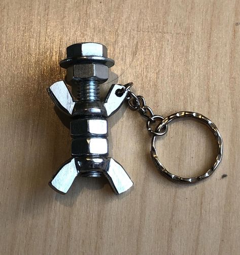 #WeldingProjectsIdeasEasy Nut And Bolt Figures, Nut Bolt Art, Nuts And Bolts Keychain Diy Crafts, Nut And Bolt People, Bolt And Nut Art, Crafts With Nuts And Bolts, Nuts And Bolts Art Diy, Nut And Bolt Keychain, Metal Gift Ideas