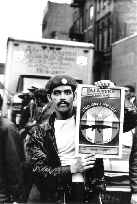 The Lords’ history began as a struggle for Puerto Rican independence and racial equality. This photograph, titled "David with Palante, V. 2, N. 4," is on view at El Museo del Barrio.  Photo credit: Hiram Maristany Library Artwork, Chicano Studies, Puerto Rico History, Puerto Rico Art, Hammer And Sickle, Punk Culture, Puerto Rican Culture, Protest Art, Photobooth Pictures