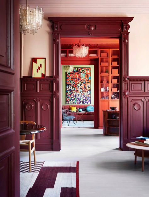 A Historic Apartment with Rich & Vibrant Color Combinations 1 Rasberry Wall Paint, Oxblood Cabinets, Red Skirting Boards, Red Trim Interior, Painted Moulding, Bold Interior, American Foursquare, Burgundy Walls, Traditional Paint