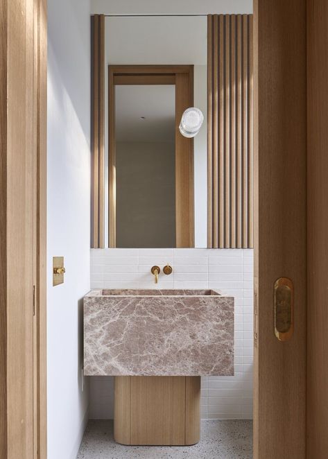 The powder room features a custom stone sink with a white oak base built by the homeowner. #dwell #homerenovations #toronto #moderndesign Bathroom Vanity Designs, 1920s House, Interior Design Consultation, Vanity Design, Stone Sink, Chic Bathrooms, Bathroom Inspiration, Bathroom Interior Design, Powder Room