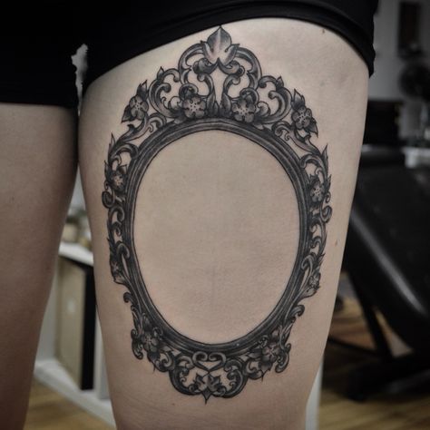 Victorian frame tattoo Victorian Frame Tattoo Gothic, Baroque Mirror Tattoo, Baroque Frame Tattoo, Portrait Frame Tattoo, Ornate Frame Tattoo, Antique Frame Tattoo, Tattoo Frame Design, Picture Frame Tattoo, Victorian Style Tattoos