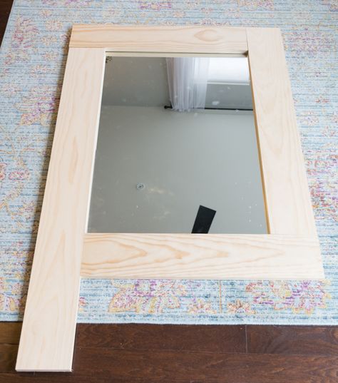 Wondering how to make a mirror frame with wood? I've got you covered! Learn how to make a simple DIY wood mirror frame for a bare mirror. Make Mirror Frame, Distressed Mirror Frame, Diy Wood Mirror Frame, Rustic Mirror Frame, Mirror Tutorial, Painting Mirror Frames, Spiegel Diy, Cheap Mirrors, Bathroom Mirrors Diy