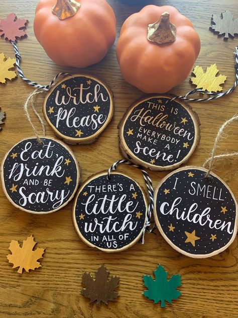 Rustic Wood Slice Decorations that are a great addition to your Halloween and Fall decor! These slices are written in white writing on a black background with some gold stars but for more colour options please see this listing -  https://www.etsy.com/uk/listing/895276696 I have made a few examples from my favourite Halloween movies and sayings but as they are made to order I can write anything you like on them, just let me know in the Personalisation Box.   Wood Slices are all different sizes but are around 6.5cm - 8cm in diameter and all come tied, with the option of twine or black and white string, ready to proudly display. Every slice is individually handmade using an oil based paint pen - I do not use stencils or vinyl! With this is mind the lettering may vary slightly from piece to pi Halloween Wood Slice Ornaments, Halloween Wood Slices, Wooden Slices Ideas, Wood Slice Pumpkins, Wood Slice Decorations, Wood Slice Decor, Halloween And Fall, Season Decor, Halloween Arts And Crafts